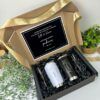caja color negro con mensaje personalizado para padrinos y con dos termos como contenido ambos con grabado laser personalizado