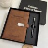 Set libreta con broche magnético plateado y bolígrafo negro en caja de regalo etiquetada ¡Felicidades Mi Director Regional!.
